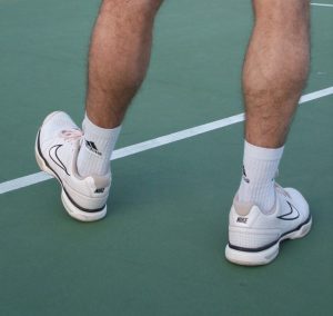 position des pieds au service modifiée